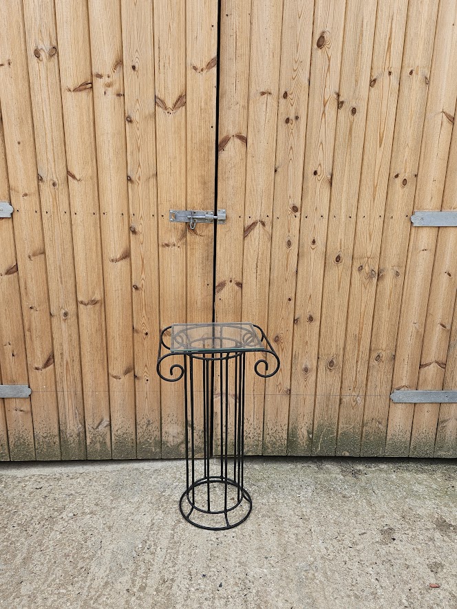 Lovely plant stand with glass top