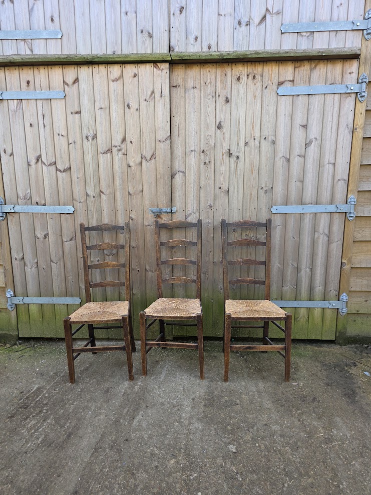3 Antique ladder back chairs with rush seats