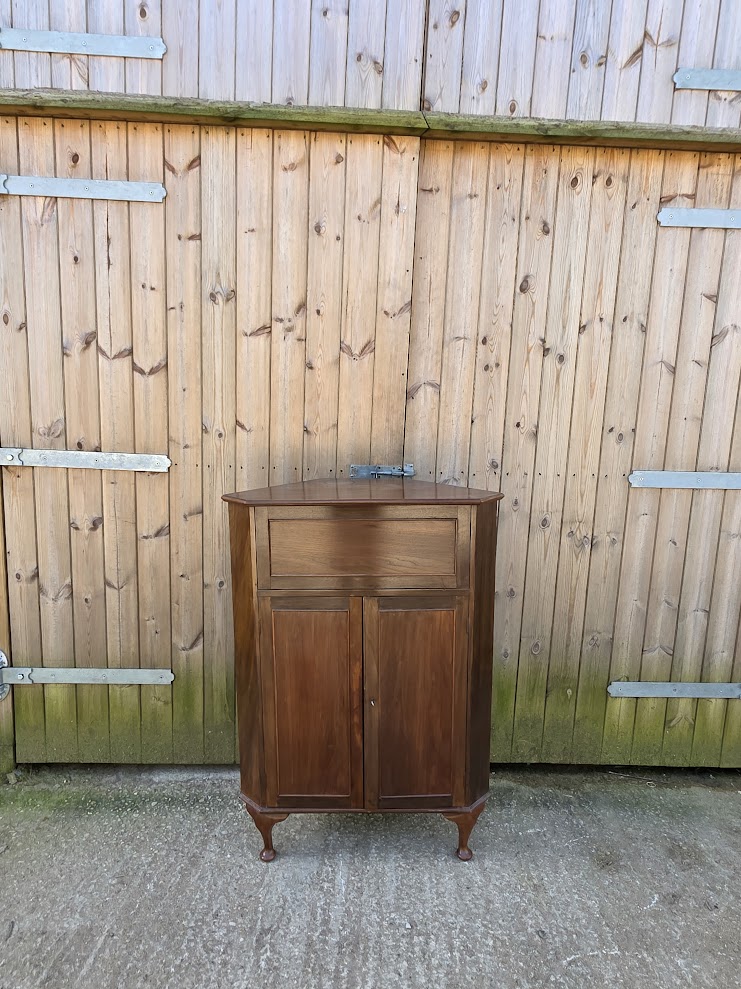 Dark wood corner cabinet