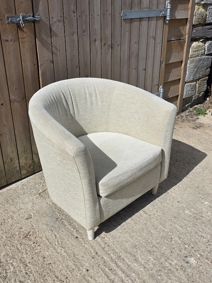 Beige fabric tub chair