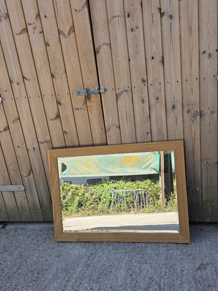 Oak frames bevelled glass wall mirror