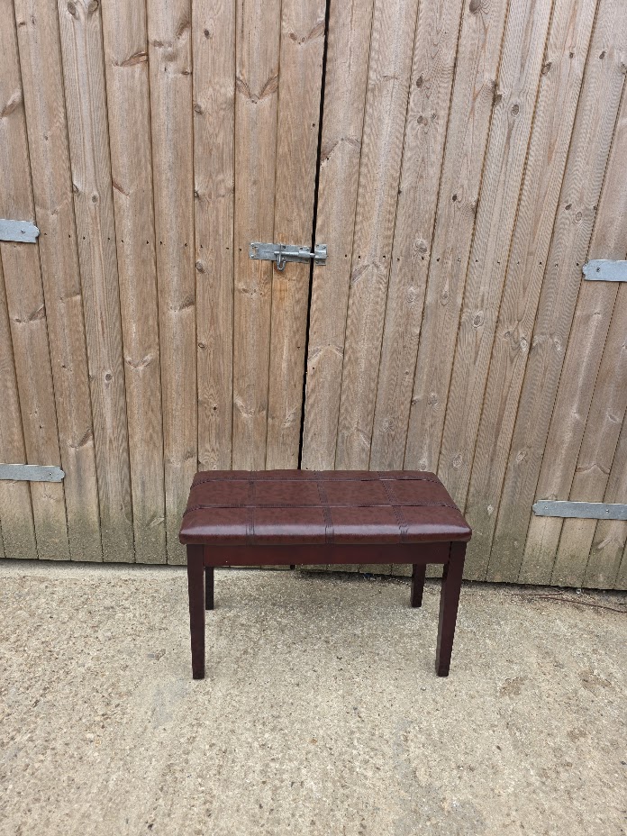 Dark brown and faux red leather top piano stool